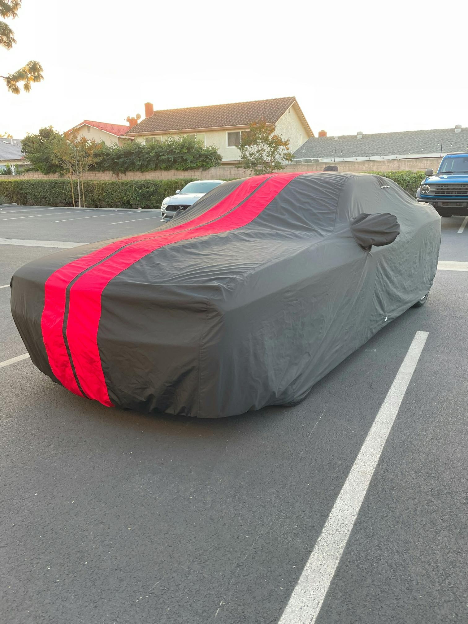 a fully-covered vehicle with a coverland car cover on it